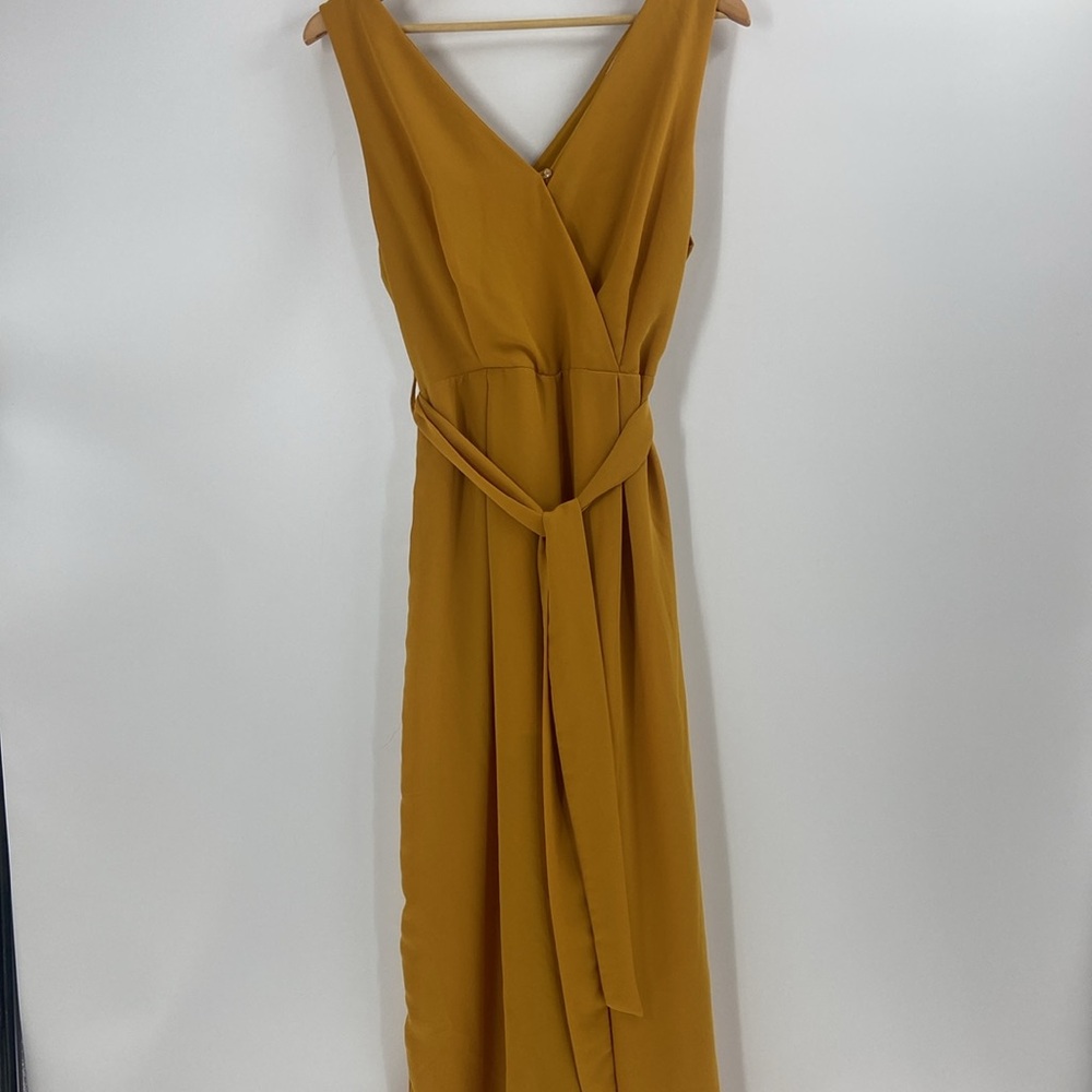 Sienna Sky golden mustard yellow color silky flowing V neck wide leg jumpsuit